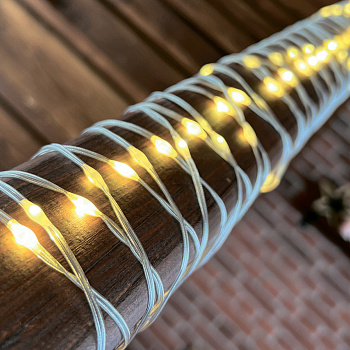 Гирлянда-нить св/д "Полоса" 100 светодиодов, теплый белый свет, провод прозрач 10м IP20 Uniel 